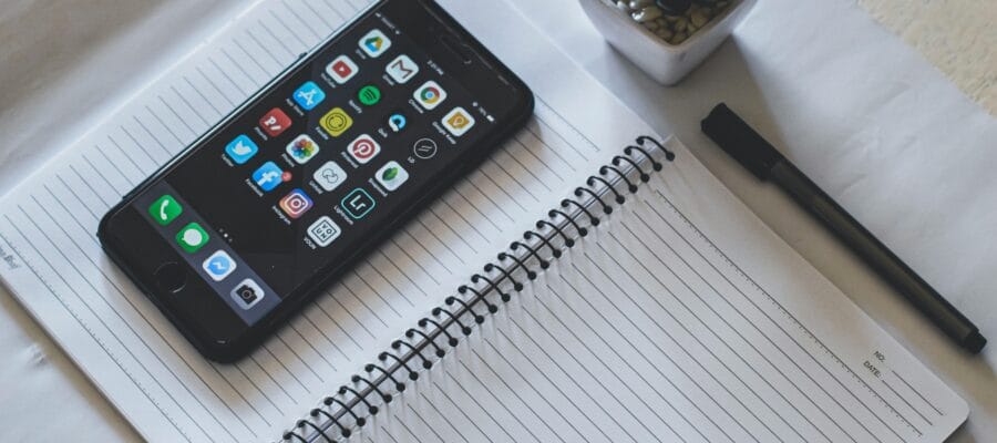 Space Grey Apple Iphone on Notebook Page