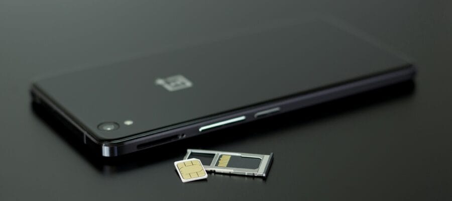 Black Smartphone on Black Table Top